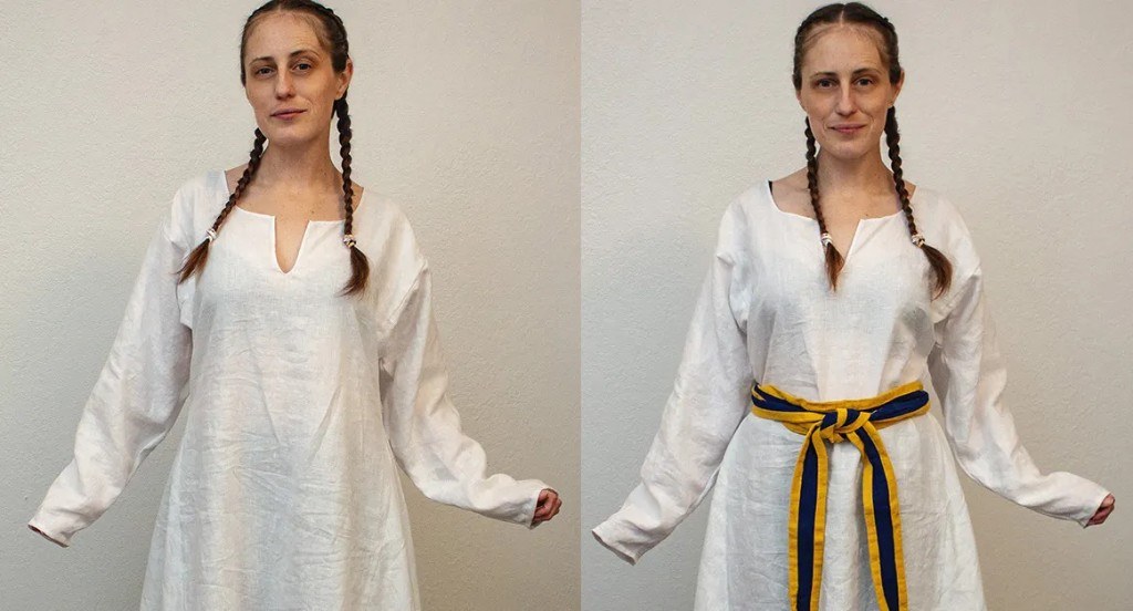 A woman wearing a medieval tunic, shown without and with a belt
